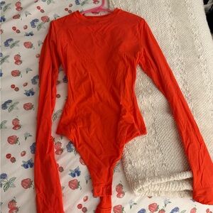 SKIMS Vibrant Red Long Sleeve Bodysuit